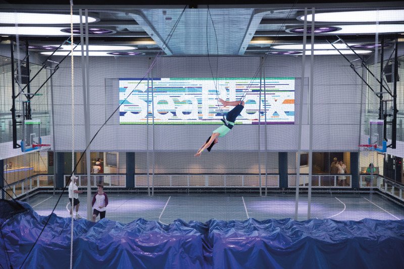 an, anthem of the seas, circus school, woman swinging on trapeze, seaplex, fun,